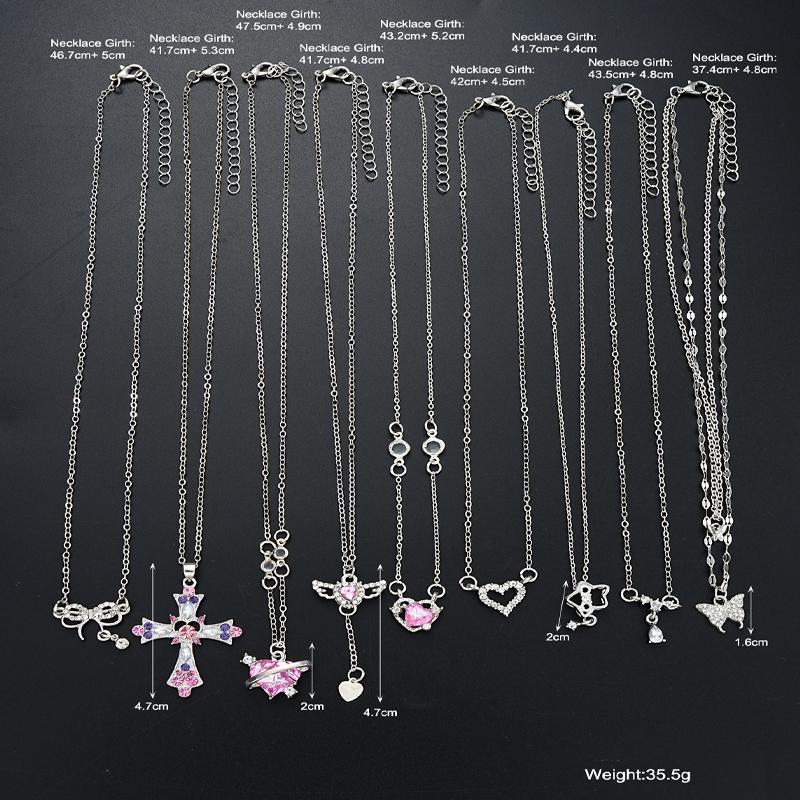 Set di 9 Collane con Ciondoli Eleganti in Zircone da Donna Moda Colore Rosa Croce Farfalla Cuore Fiocco Collane Gioielli da Festa Regalo