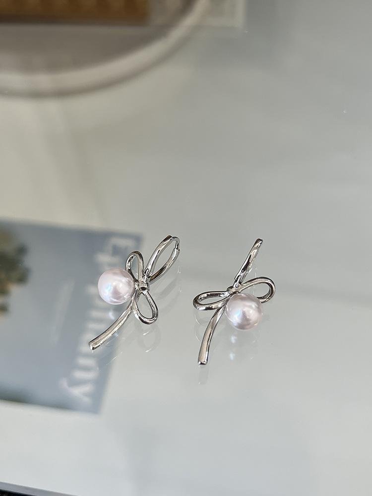 

Ballet girl ribbon bow pearl earrings new high-end unique ear buckle earrings срібний