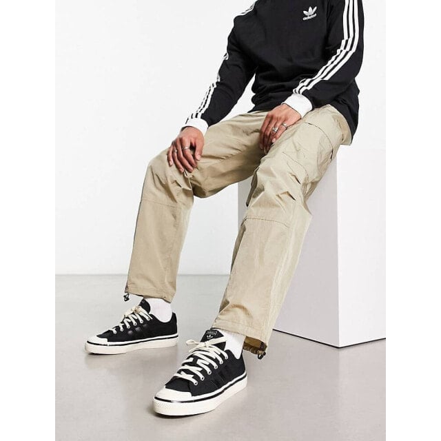 

Черные кроссовки adidas Originals Nizza RF 74