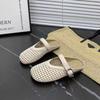 Hollow bag head half slippers women's breathable new summer mesh outer wear soft bottom slippers woven shallow mouth flat bottom sandals