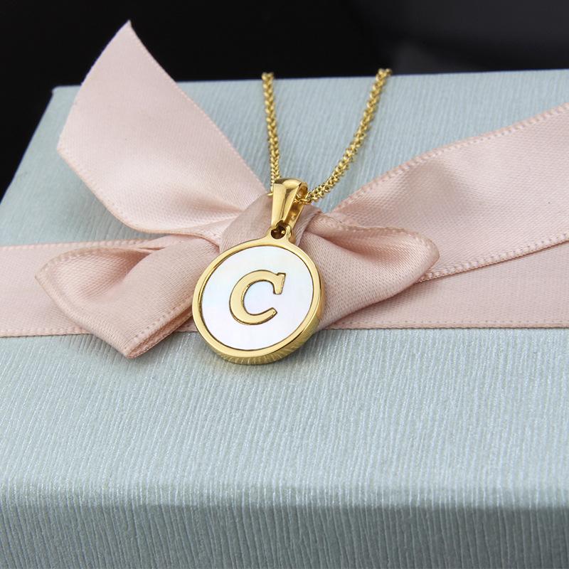 

New Stainless Steel Round Shell Letter Necklace. Simple English Titanium and Steel Pendant. C