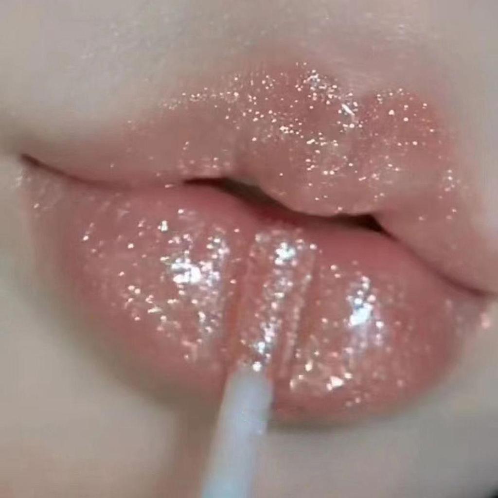 SHAQINUO Plumping Sparkle Lip Gloss: Watery Mirror Finish, Hydrating Lip Oil for Pouty, Glossy Lips.