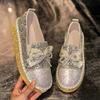 Flat-soled single shoes women's spring and autumn new fashion thick-soled rhinestone bow one pedal