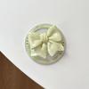 Solid Color Bow Magnetic Suction Mobile Phone Airbag Bracket Wind Desktop Retractable Bracket Watch Drama Creativity