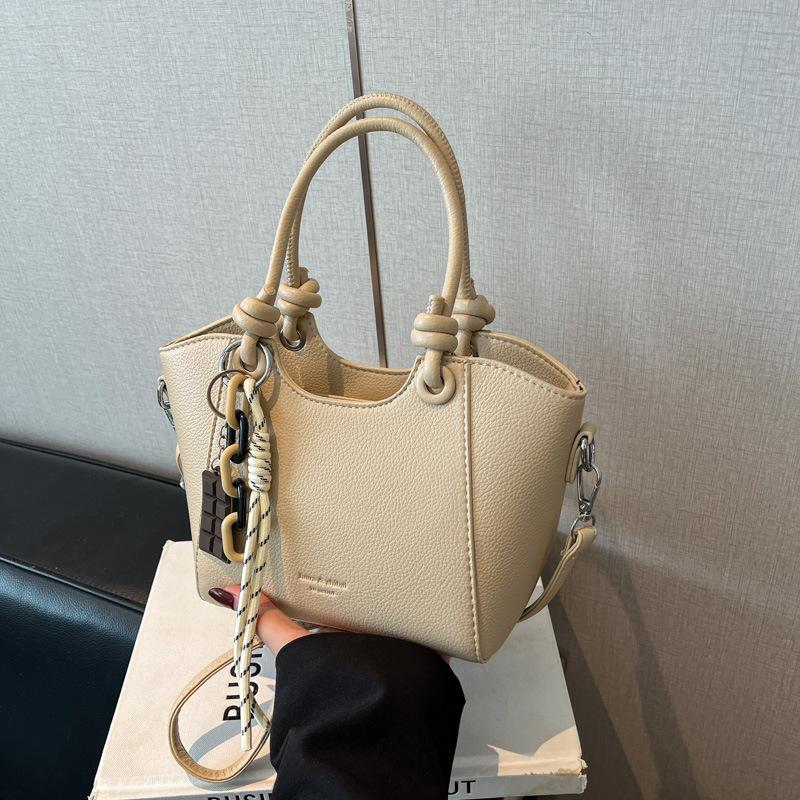 

High-end niche bucket bag women s new casual versatile shoulder messenger bag fashion handbag бежевый