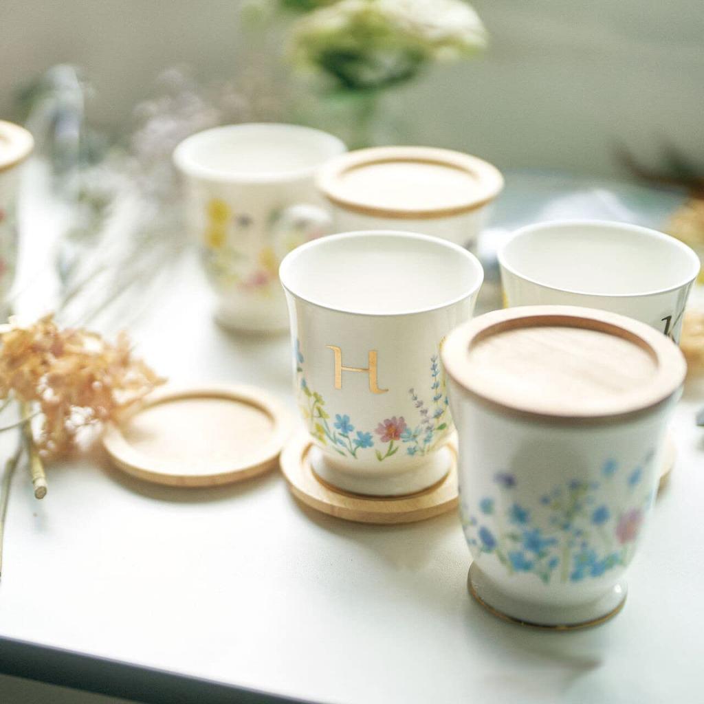 This Elegant 350ml Mug Features a Delicate Floral Design and a Gold Initial It Comes with a Coaster That Doubles As a Lid or Small It Also Comes In a