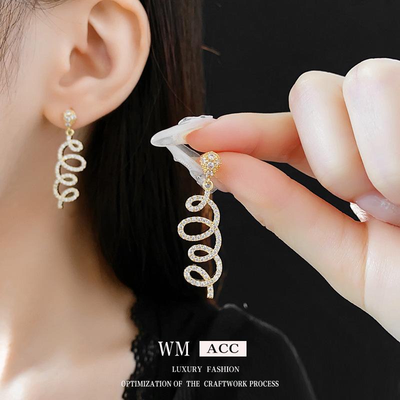 Silver Needle Zircon Water Drop Earrings - Light Luxury, Exquisite, Cold Style, High-End Fashion Statement.