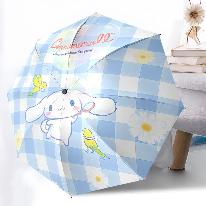 Portable travel umbrella with cute Sanrio character designs, UV-protective folding umbrella.