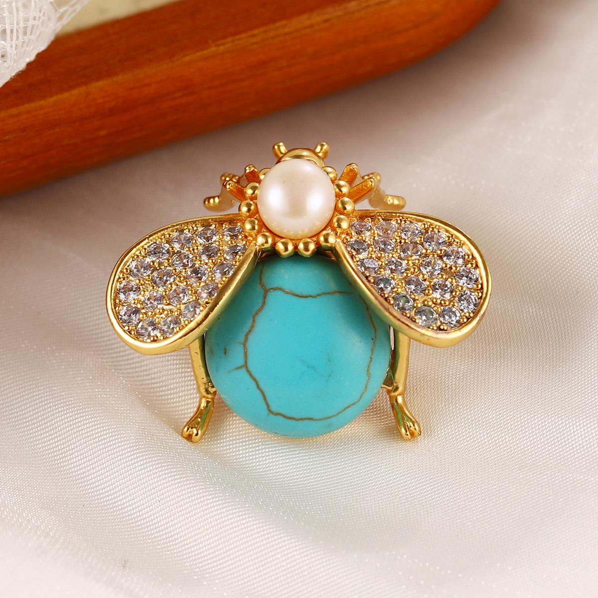 Vintage turquoise earrings, high-end niche stud earrings, fringed pearl butterfly fan earrings, new versatile fashion women