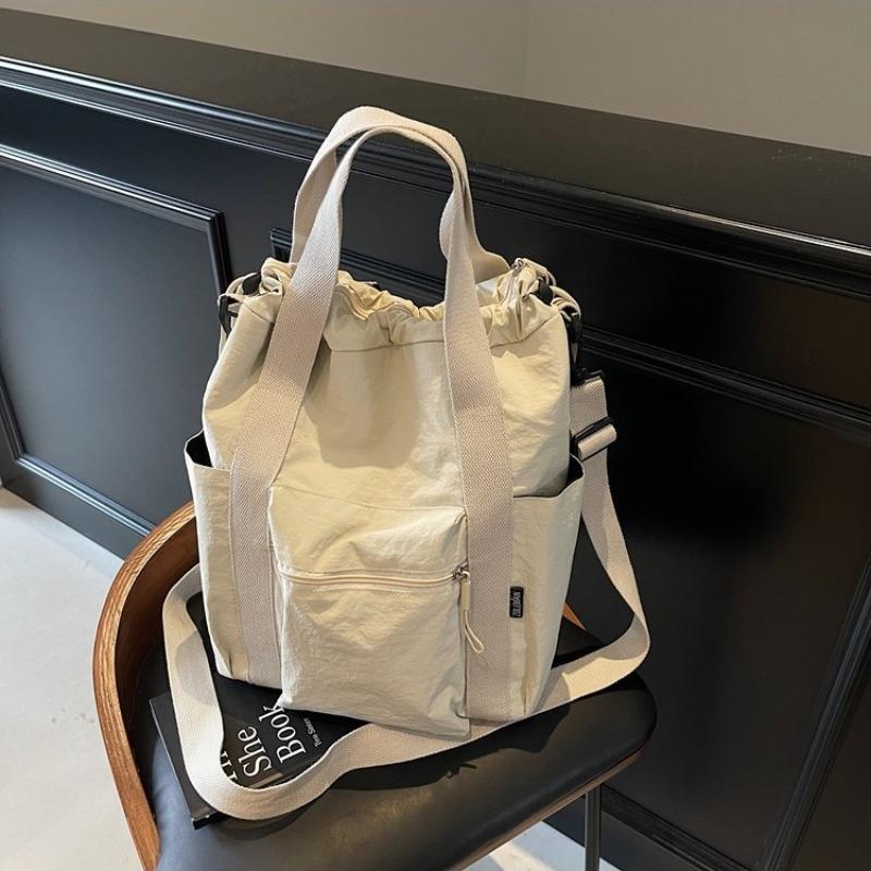 Large-capacity commuter tote bag women's summer new canvas shoulder messenger bag multi-functional backpack