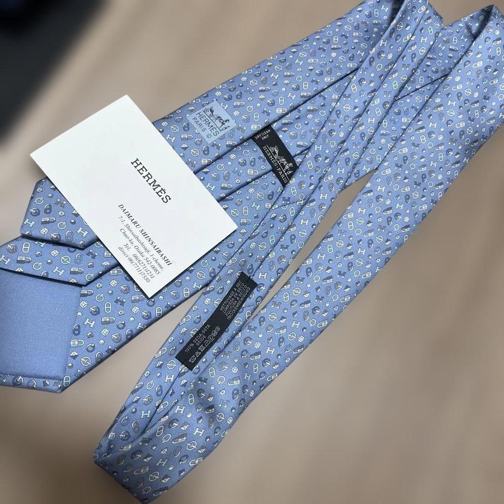 Used HERMES tie, light blue, all-over pattern, 100% silk