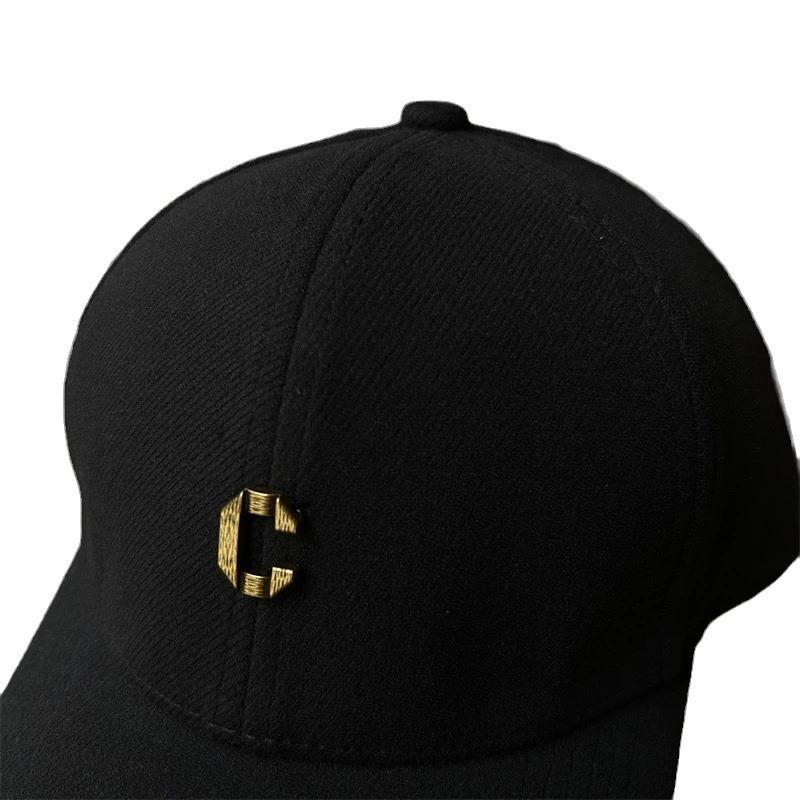 Autumn and winter three-dimensional letter woolen material hard top warm baseball cap men and women versatile face small cap tide