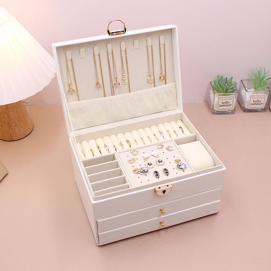 

Роскошная трехслойная кожаная шкатулка для украшений с ромбовидной стежкой белый