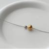 Elegant Two-Tone Gold & Silver Bead Necklace with Rotating Clavicle Design, Titanium Steel, 18K Gold-Plated, Fade-Resistant