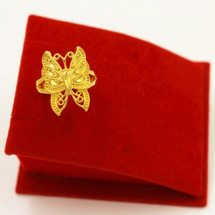 

Регульоване золоте кільце-метелик з дизайном зірки та квітки