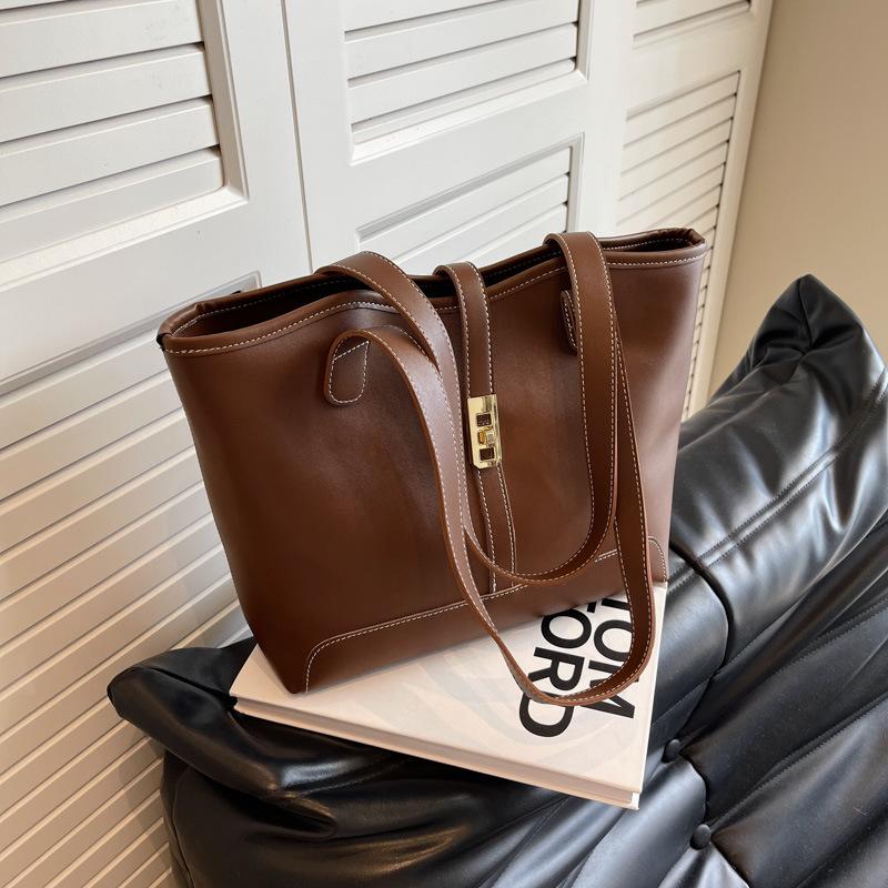 

Жіноча сумка 2024 р. Нова приміська сумка великої місткості Осінь і зима Універсальна сумка через плече Студентська сумка коричневий