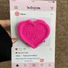 MagSafe-Compatible Silicone Heart Stand with Strong Magnetic Hold and Retractable Airbag Design for Desktop Use