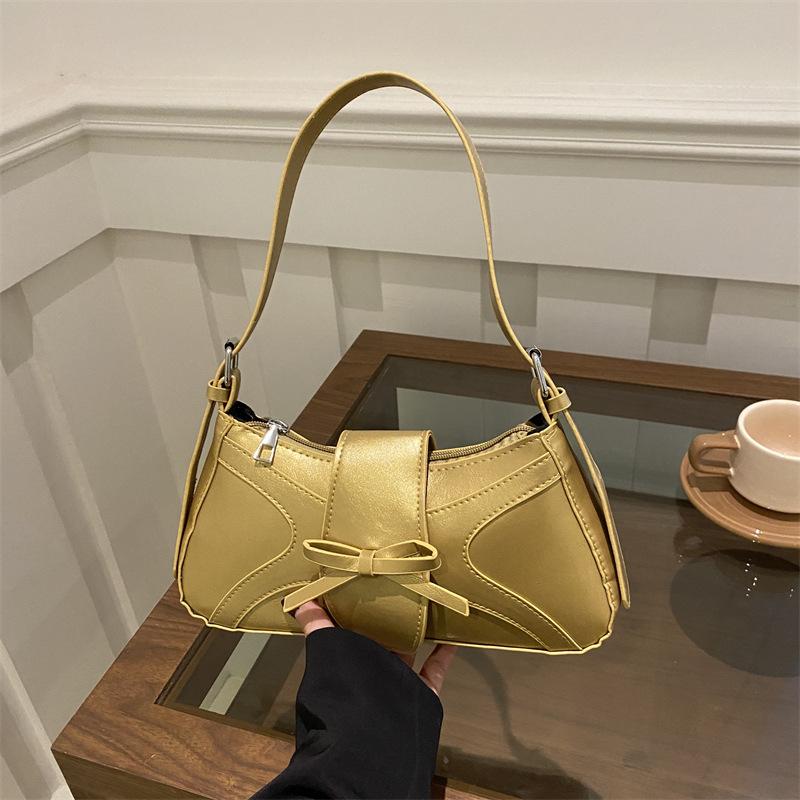 Silver small underarm bag women's 2025 new summer high-end French niche design baguette shoulder bag