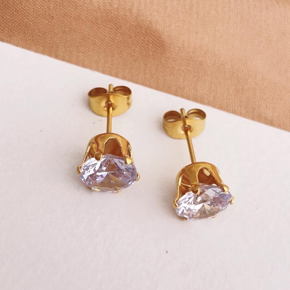 

Super flash zircon temperament stud earrings, simple single diamond titanium steel earrings, women s niche two-color optional gifts