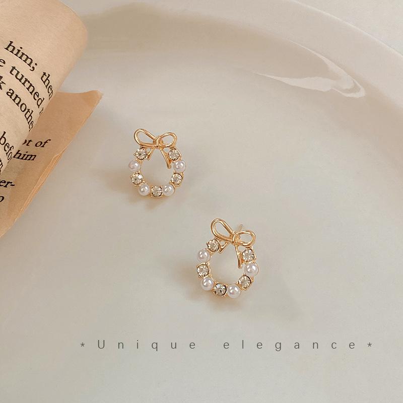 S925 Silver Needle Sweet Versatile Unique Imitation Pearl Bow Stud Earrings Trendy Niche Design Sense Premium Earrings