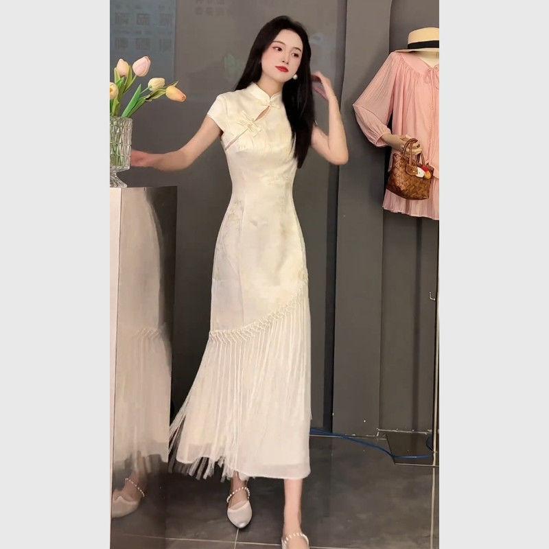 Nuova gonna cheongsam in stile cinese, nuovo temperamento unico e bello, abito beige di alta gamma con vita a intarsio