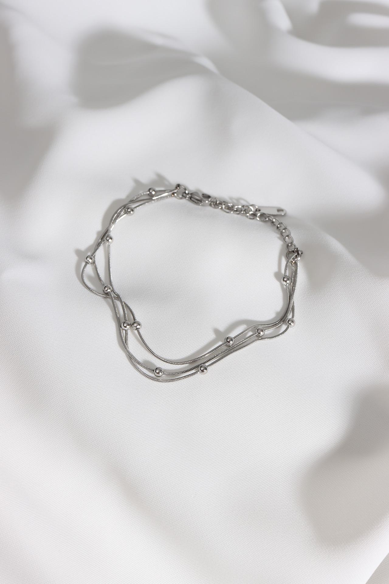 

Браслет из 3-х цепочек стального серебряного цвета