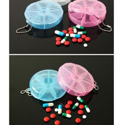 Pilulier de voyage 7 compartiments Mini étui à médicaments Portable PP Forme ronde Sept grilles Rotatif Boîte de rangement pour pilules et vitamines