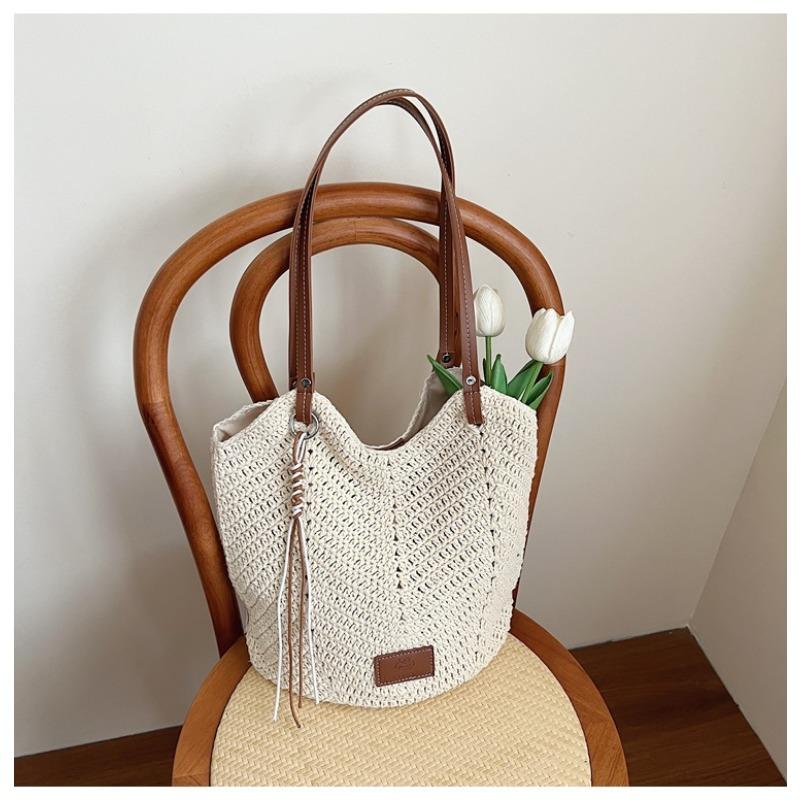 Niche portable woven tote bag women's new summer casual rope weaving holiday style trend shoulder bag