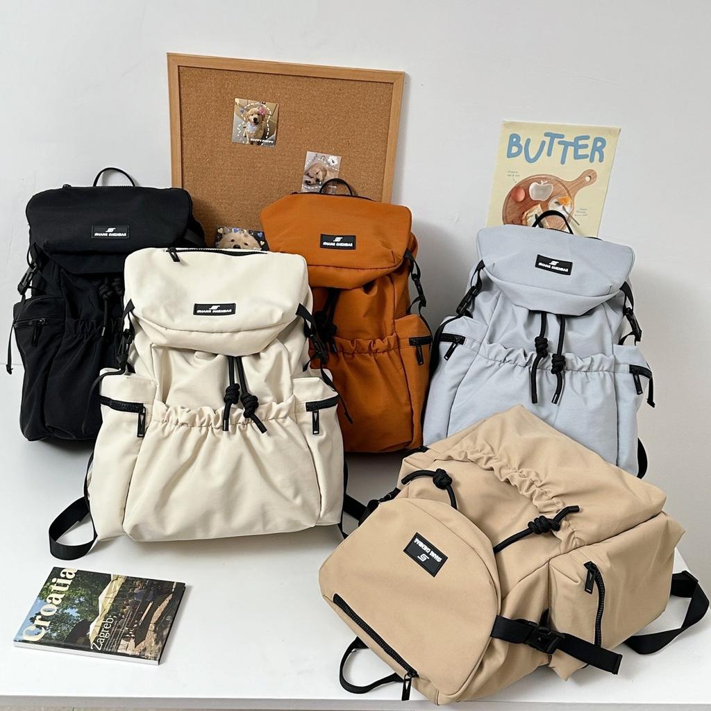 2025 Nova Mochila Casual de Viagem de Grande Capacidade com Duas Alças Mochila Escolar para Estudantes Universitários e do Ensino Médio Mochila para Uso Externo e no Trajeto Bucke