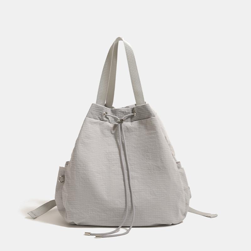 Simple, lightweight, casual nylon drawstring bucket bag, large-capacity backpack, women's commuter shoulder and crossbody bag