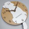 Stylish wooden pendulum clock featuring a toy poodle in white and cream. Silent, perfect for bedrooms, bedrooms, or any room.