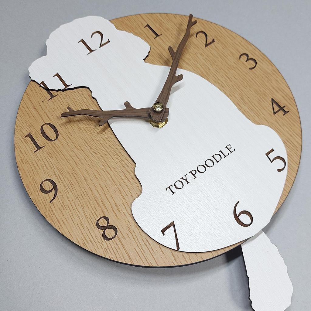 Stylish wooden pendulum clock featuring a toy poodle in white and cream. Silent, perfect for bedrooms, bedrooms, or any room.
