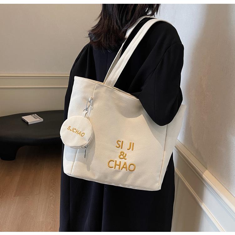 Women's Large-capacity Canvas Bag, Simple Letters, Versatile Commuting Artifact.