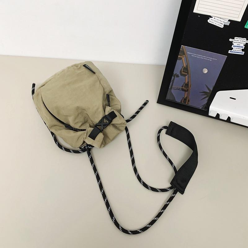 

Mobile phone messenger bag men s and women s neutral wind outdoor sports small satchel bundle bucket bag trendy mini shoulder bag хаки