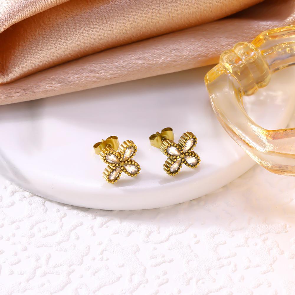 Trendy High-End Zircon Titanium Four-Leaf Clover Jewelry Set: Necklace, Bracelet, Earrings for Women