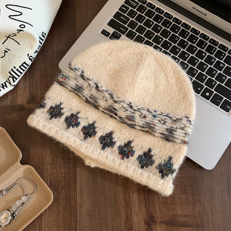 Jacquard knitted crimped headgear women's autumn and winter warm new fashionable versatile face small wool hat