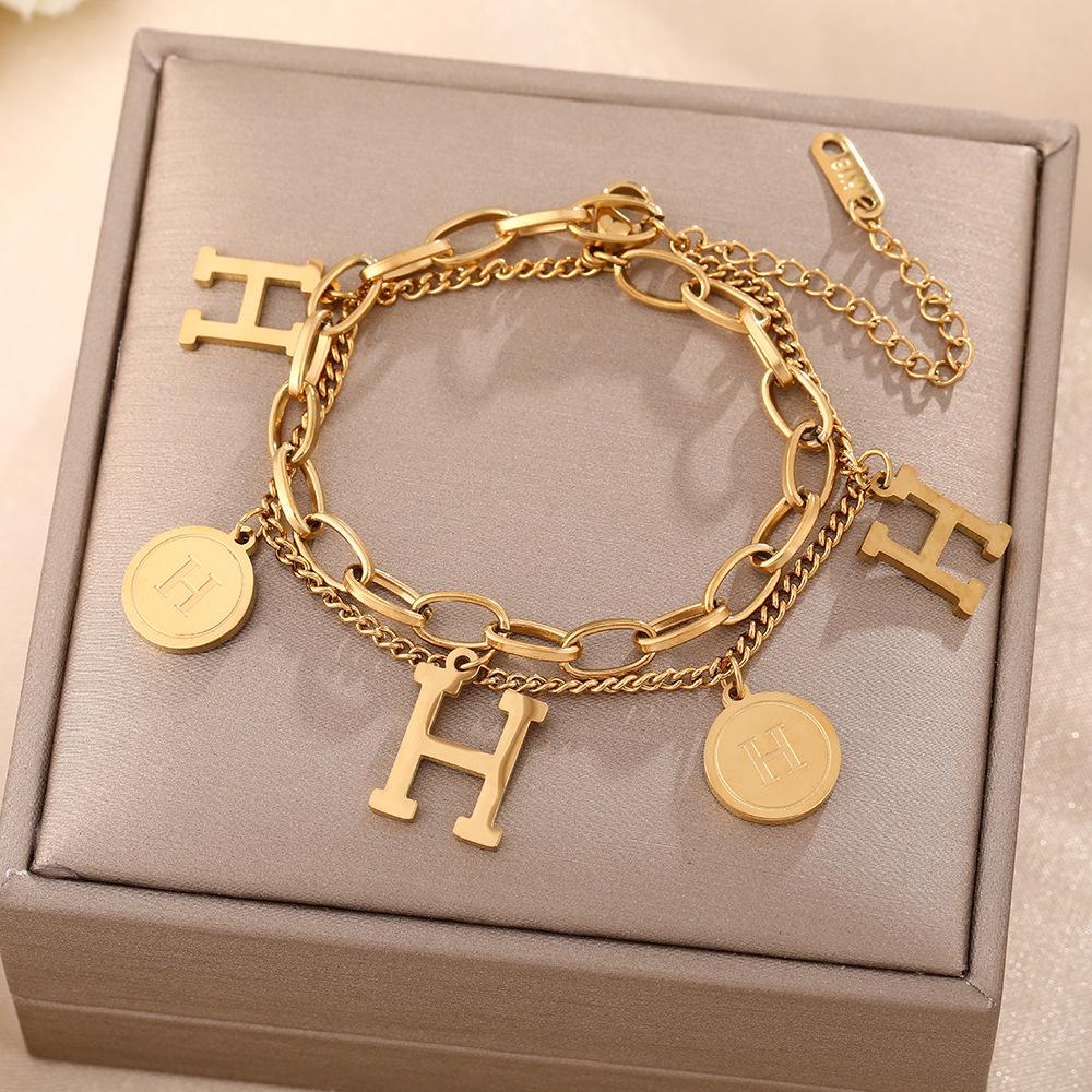 Luxe Titanium Staal Vierbladig Klaver Armband in Koreaanse Stijl met Ingelegde Diamanten voor Vrouwen - Kleurvast