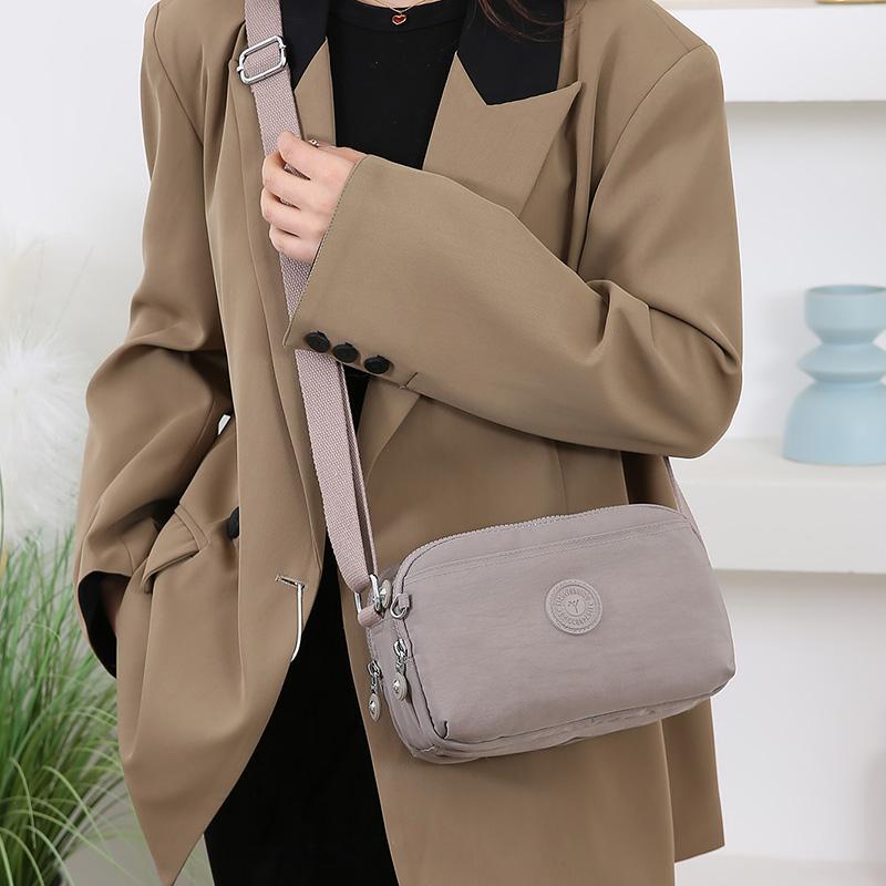 Nylonová crossbody taška s více kapsami, dámská lehká malá taška přes rameno
