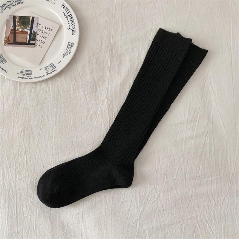 

Winter In Hokkaido Cashmere Warm Calf Stack Socks Medium Length Solid Color Vertical Texture Maillard One size fits all чорний