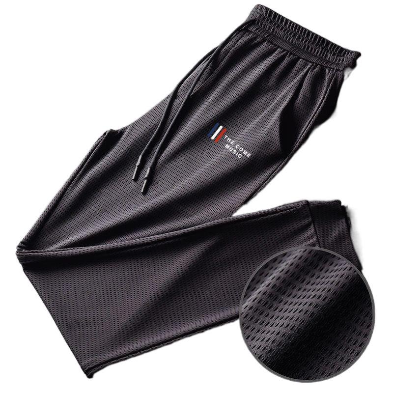 Pantalones de trabajo transpirables de secado rápido para hombre: holgados, duraderos y resistentes a la suciedad para el verano.