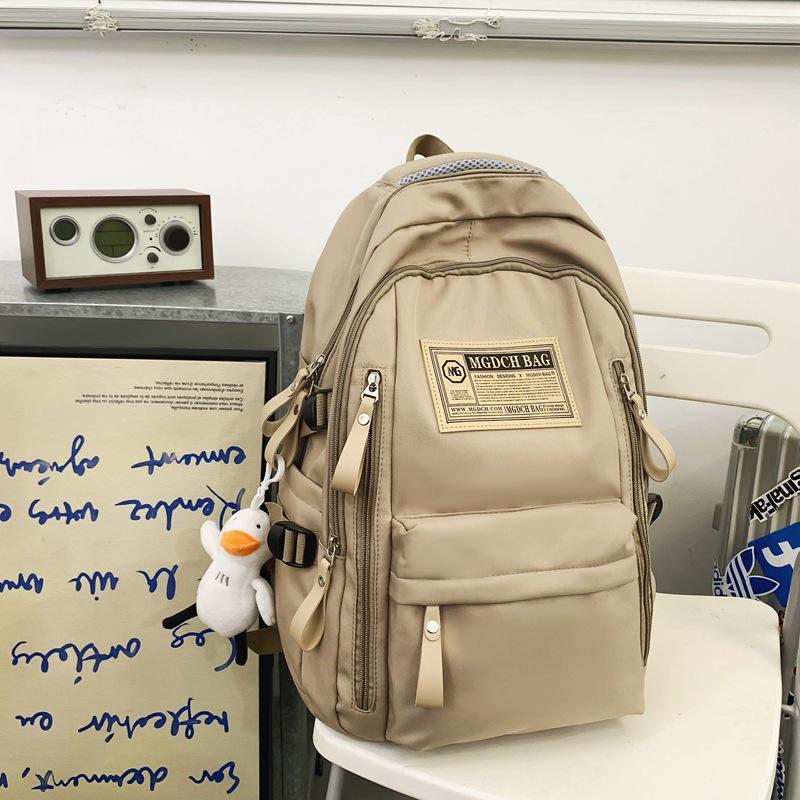 Fashionable Water-Repellent Student Backpack: Trendy High-Capacity Design for Couples