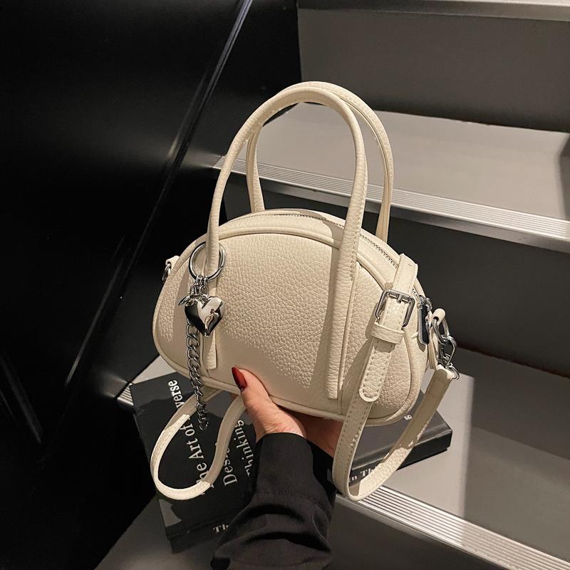 

Изысканная сумочка, сумка-боулинг, женская новая нишевая универсальная сумка-мессенджер высокого класса бежевый