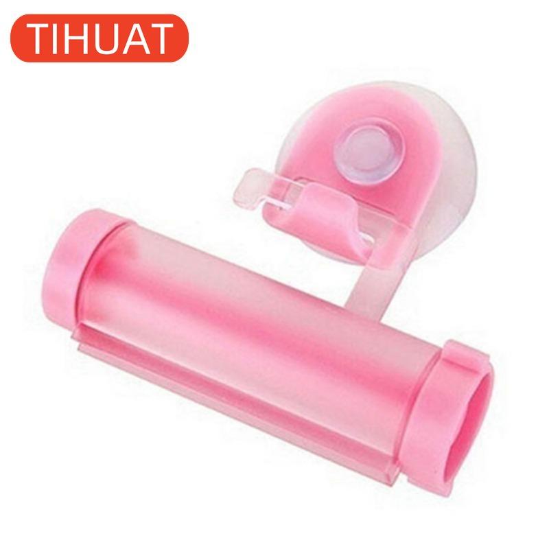 Plastic Device - A Suction Cup Press for Convenient Storage and Uniform Squeezing of Toothpaste Tubes