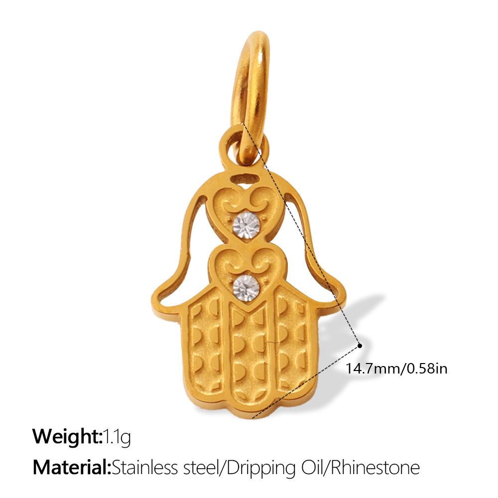 European and American retro exotic jewelry pendant golden Fatima hand evil eye element decorative pendant