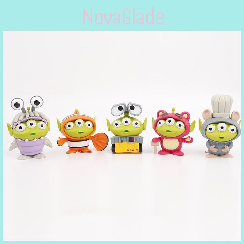 Adorable Three-eyed Alien Figurine In Various Character Costumes Fun Collectible