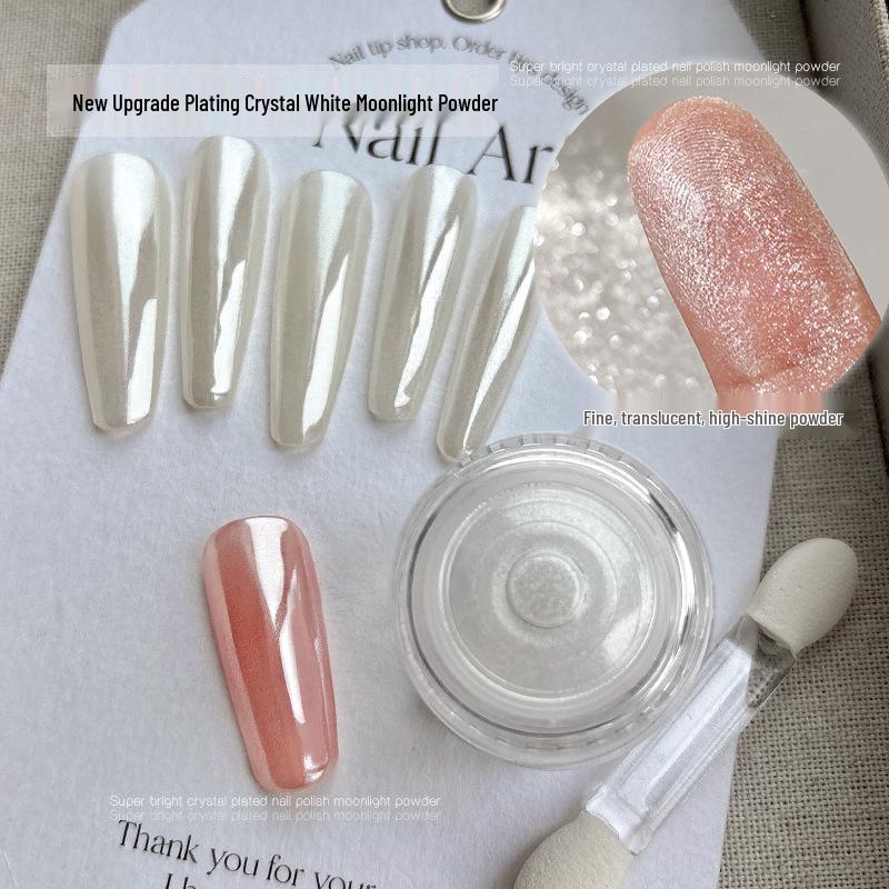 Aurora Nail Art Powder: Upgraded Crystal Coating with White Magic Mirror Effect for Easy Application and Super Bright Silver Finish.