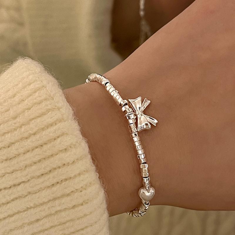 

Модный простой браслет с жемчугом и бантом женский