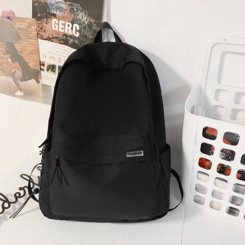 Minimalist School Commuter Backpack with Detachable Duck Plush Keychain Multi Pocket Lightweight Rucksack for Students Travel