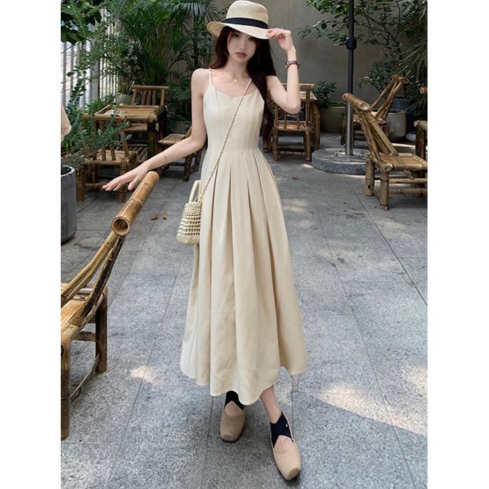 Hepburn style suspender dress summer 2026 new French celebrity temperament waist thin medium and long pleated skirt