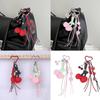 Eleganter Kirsch Schlüsselanhänger Taschenanhänger Praktischer geflochtener Seil Schlüsselhalter Taschen Anhänger Stilvolles Geldbörsen Accessoire Für Frauen